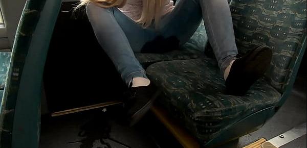  Sexy exhibitionist strips and pisses on the bus and again outdoors and goes to the intercom naked